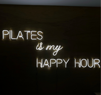 Letrero Led Neon Pilates en Acabado Acrílico Transparente con Luz Cálida