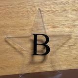 Estrella con Inicial Personalizada en Acrilico Transparente y Negro