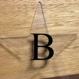 Estrella con Inicial Personalizada en Acrilico Transparente y Negro