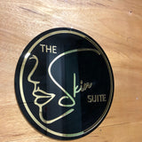Letrero con Logotipo de The Skin Suite en Acabado Acrilico Negro y Espejo Dorado
